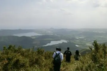 Trying a side trail down, view of the rolling hills of eastern Ishigaki