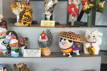 Various subjects appear on hagoita and sculptures