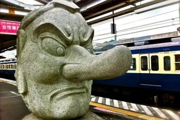 Check out the Tengu statue at Takao Station before you head to Sagamiko Station