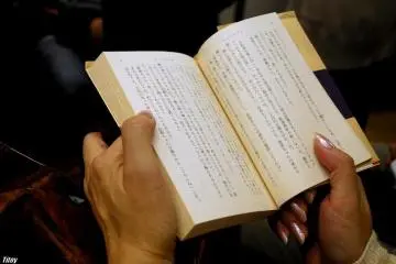 Reading a book is a great way to pass time on the metro