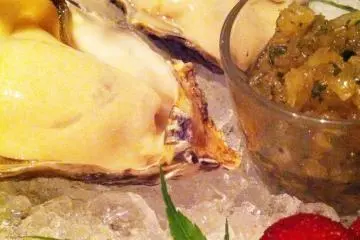 How about some oysters on a half shell topped off with Nobu's house salsa?