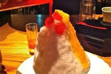 Shaved ice with pour your own flavoring for dessert