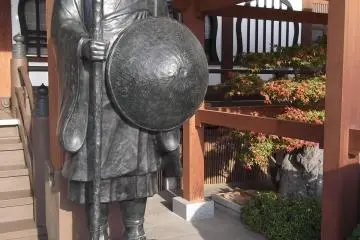 A pilgrim by the prayer hall