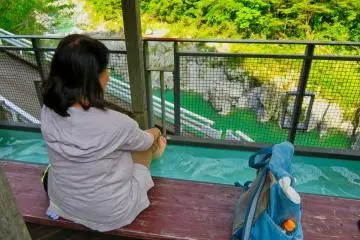 Enjoying footpath hot spring at rest stop