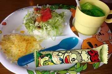 <p>The kid's taco rice comes with taco rice, hash browned potatoes, a corn snack and choice of beverage</p>