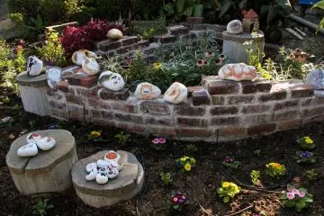 Cute garden with cat painted stones