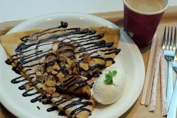 <p>This choco-banana and almond crepe was such a treat and the perfect portion to share with a date.</p>