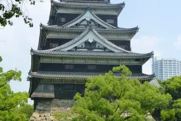 The castle stands tall, making it visible from all around the moat walk