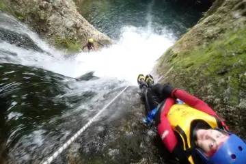 Here I am about to slide 20-meters into a watery abyss. (Photo: Canyons Japan)
