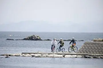 Cycling on the seaside road