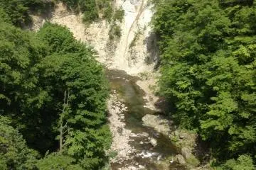 The river flowing from the waterfall.