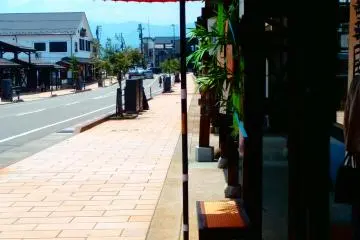 These red parasols with benches are there for you to sit and rest