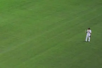An outfielder in between innings
