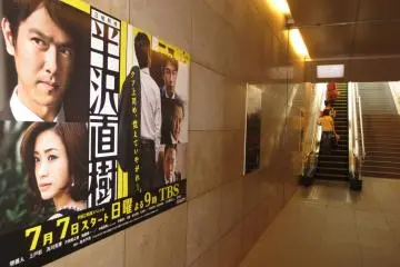 Drama posters lining the walls leading to TBS headquarters