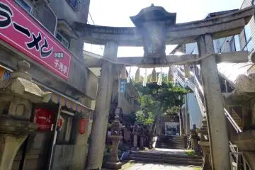 A grand entrance to a shrine beside the tourist information center