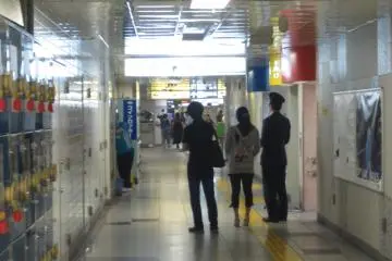 Helpful station workers, coin lockers and colorful bathroom signs