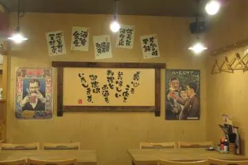 Fun decorations on the wall with hangers (perhaps to hang up business suits!)
