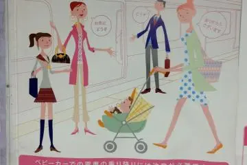 Another cute sign encouraging passengers to let mothers with small children board first