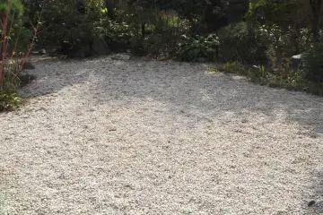 The unraked gravel of the garden