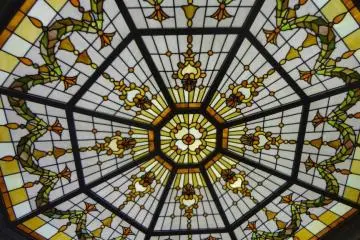 Lovely stained glass sunlight in the ceiling.