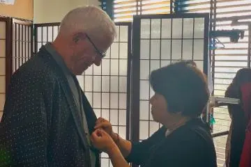 Being fitted for Samurai Outfit