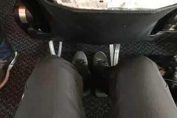 I am 178 cm tall, there is plenty of leg room for me
