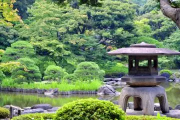 One of many stone garden lanterns decorate the area