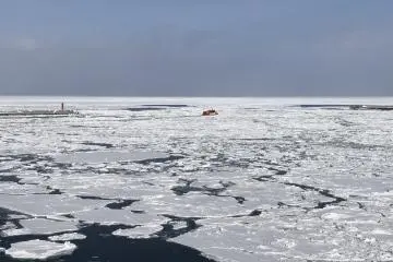 Before my scheduled ride, I saw the ship taking out some other passengers off the coast!
