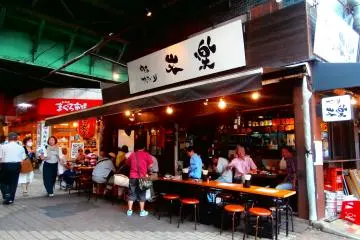 Many people start drinking in the middle of the day here—they make the area lively