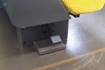 at the click of the lever (look below the seats)
