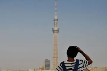 A visitor observing the Skytree Building
