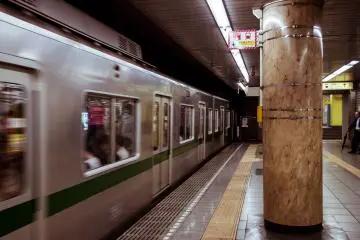 Trains rush into the station quite quickly.