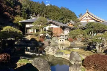 A receiving hall and a small pond make a postcard perfect photo.