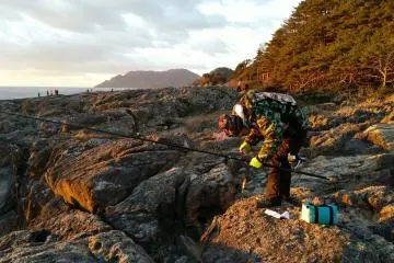For some fishing is more interesting than the sunrise