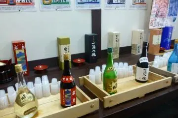 Sake samples at Kamotsuru brewery