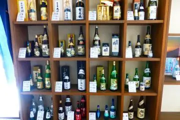 Sake on display at Kamotsuru brewery
