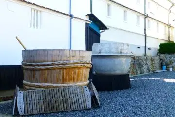 Big barrels on display outside Kamotsuru brewery