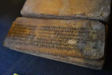 Holy book made from bark that is written in Nepalese characters. (Photo: Mifthanzi Ariana Sarashanti)