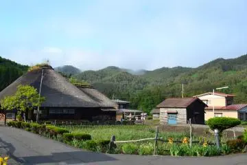 The quiet and peaceful museum surrounded by fields and mountains. In the distance a yamase makes it way across the forest, carried from the sea in the distance. (Photo: Mifthanzi Ariana Sarashanti)