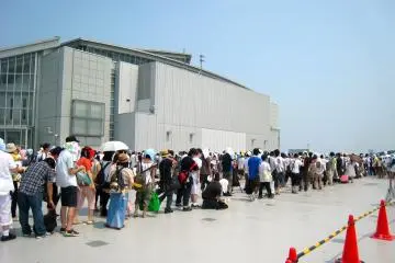 The queue for popular commercial booths outside West Hall