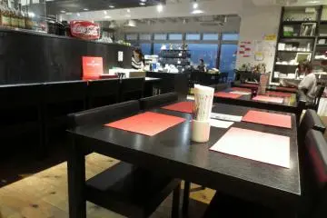 Seating at the cafe with placemats for decorating and doodling on