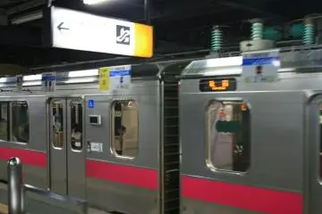 Getting on the red train.