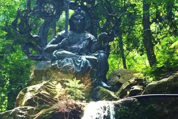The water, being fed from a hose, is free of falling rocks which is the usual problem with ascetic training under waterfalls