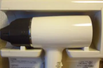 Hairdryer above the dressing table