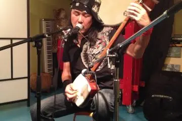 "Yugo & The One Man Travellin Band". A unique performer, Yugo got everyone going with his upbeat and powerful shamisen BLUES!