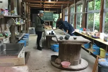 The brightly lit and well ventilated workshop. Big windows allow you to look out and be inspired by nature while you work.