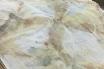 A finished piece of fabric dyed naturally.