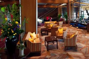 The lounge area is large, warm and comfortable and has so many art pieces it could be a museum.