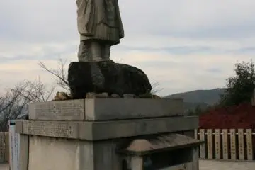 Buddhist statue on the lookout area.