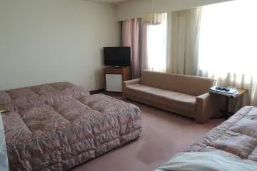 Different angle of the triple bedroom